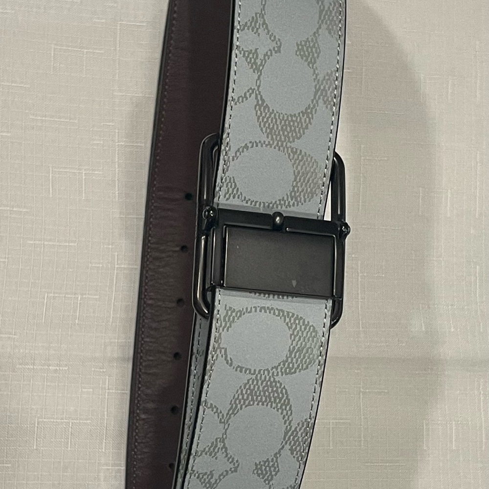 Use like new Coach reversible silver and dark brown leather belt